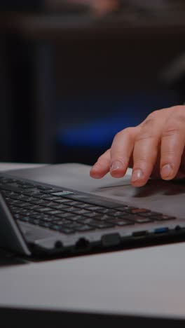 vertical video close-up of executive man hands answering negotiations email