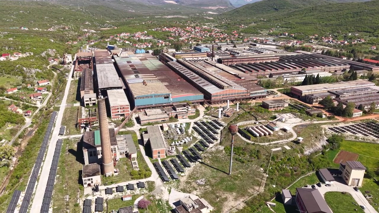 Aerial View of Niksic Steel Mill, Former Old Factory and New Solar Energy Installations, Montenegro Europe, Drone Shot