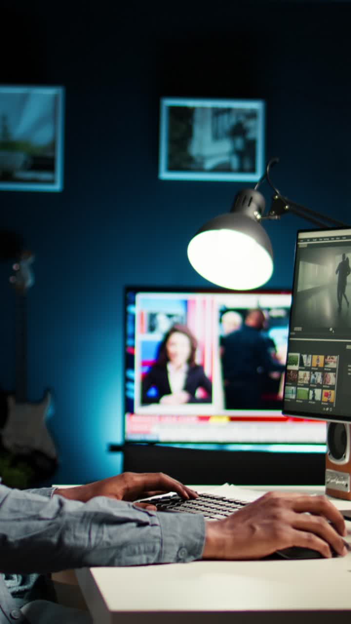 Man editing video on computer