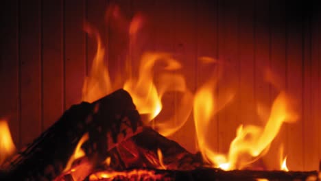 Burning-Flame-At-Fireplace-on-wooden-logs