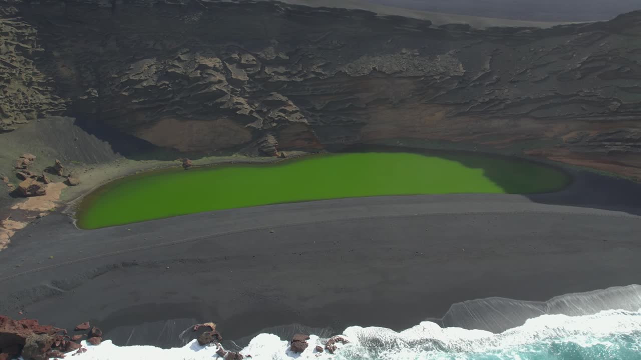 Aerial drone view of mountain sea and volcanoes in Lanzarote, Canary Islands, Spain