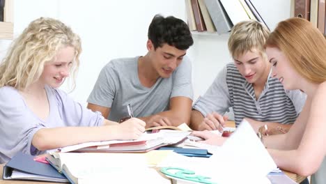 group of adolescents studying together