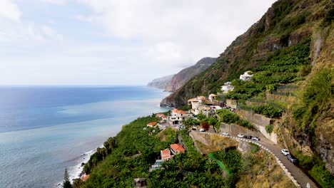 Capture-the-thrill-of-driving-along-Madeira's-scenic-coastal-roads,-where-each-bend-reveals-a-new-perspective-of-the-island's-rugged-beauty