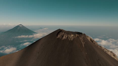 panorama of fuego volcano with agua volcano in the background in guatemala