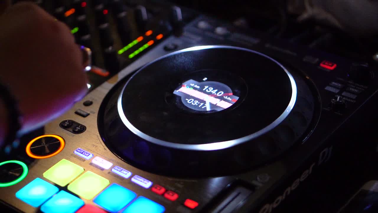 Dj playing on a controller