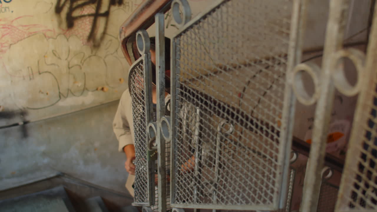 Man Taking Photos Inside Abandoned House