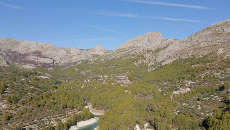 aerial view of the mountains and the guadalest reservoir in alicante, spain