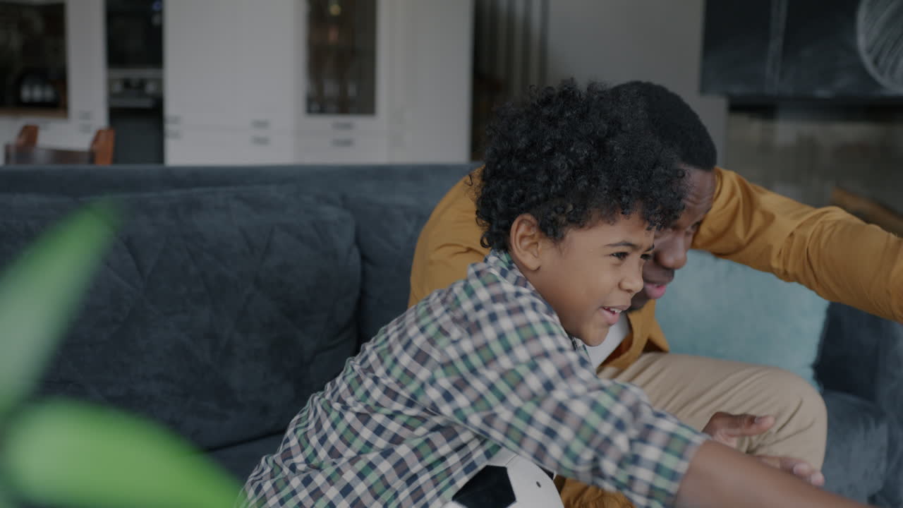 Father and Son Supporting Team