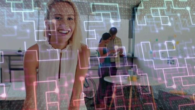 Blonde woman working on desk papers, driving team checking device while tech grid marking notes