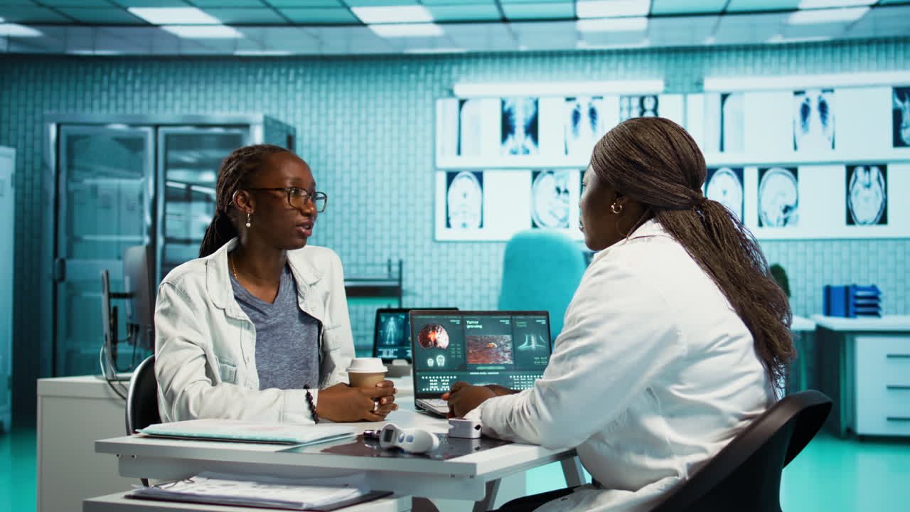 Medical consultation in progress with a specialist advising a patient
