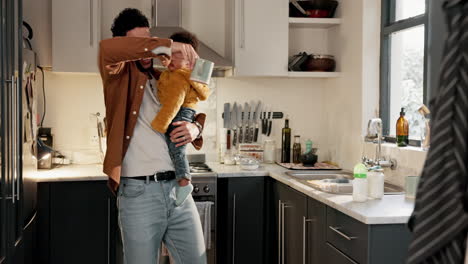 father and child in kitchen