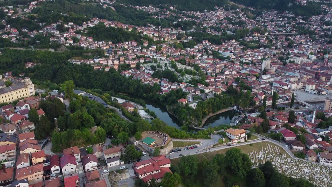 Stunning drone view and pan up from Yellow Fortress and Jajce Barracks to reveal Mount Trebević with Sarajevo Cityscape - Bosnia and Herzegovina