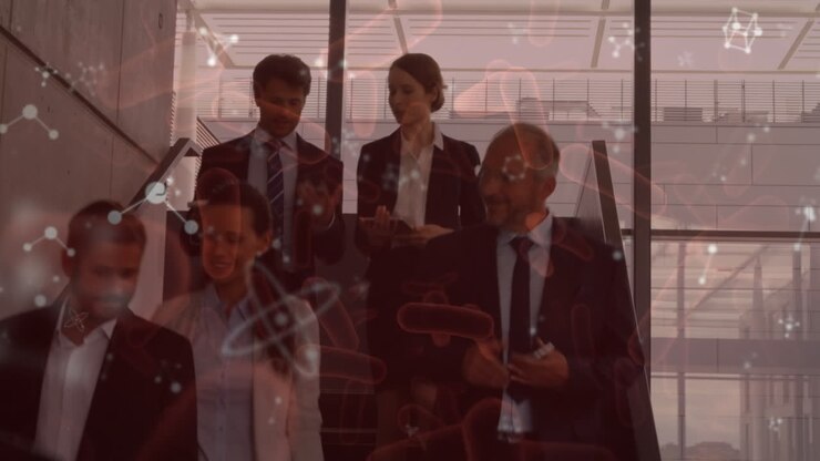 Animation of microbes and molecules over diverse businesspeople walking in office