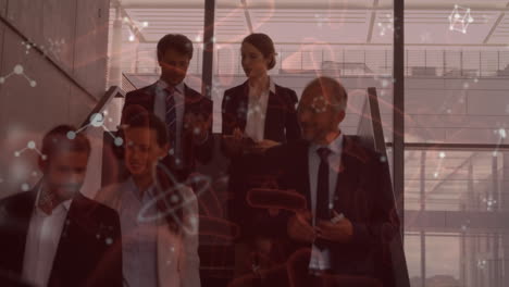 animation of microbes and molecules over diverse businesspeople walking in office