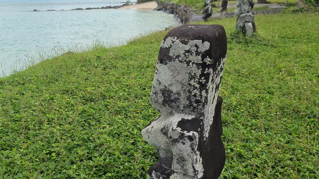 Anini Mara'e Ancient Ceremonial Site on Huahine Island, French Polynesia. Stone Sculptures by Ocean