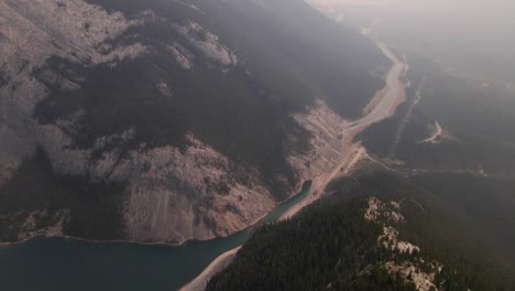 the huge rocky mountains range during vast wildfire, canada