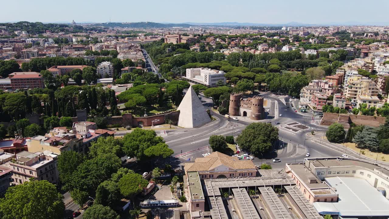Ancient meets modern at Rome's Pyramid of Cestius, Porta San Paolo gate, Italy