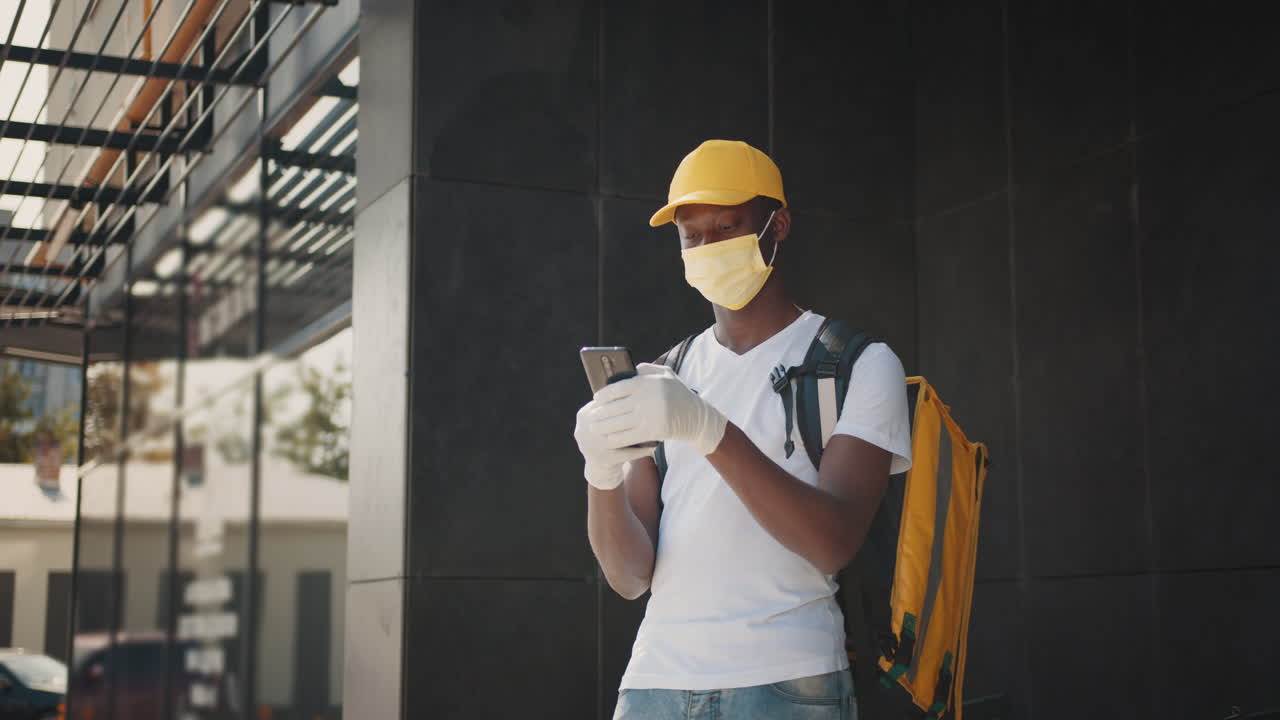 Delivery Person Taking Order on Smartphone