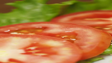 sliced tomato salad with fork