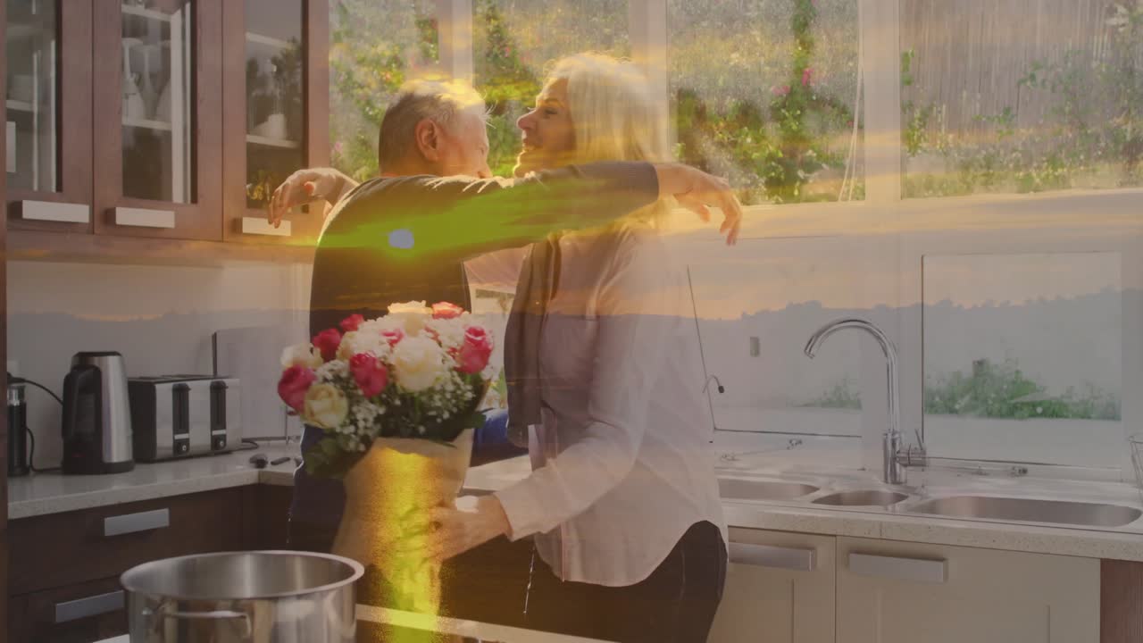 Homem idoso oferecendo buquê demonstrando amor na cozinha, adicionando ícones de corações flutuantes para estilo de vida