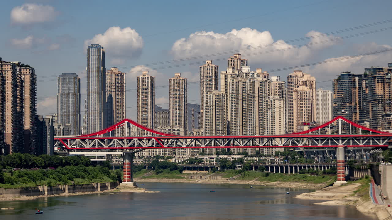 Timelapse of the amazing Chongqing cyberpunk city skyline from a high vantage point wirh the yangtze river
