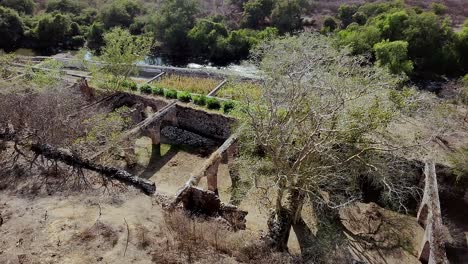 ascending shot over the majestic ruins of the hacienda and all its beautiful landscape
