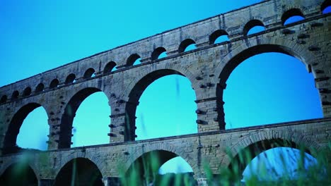 old roman stone arch bridge in france as a water pipe of history