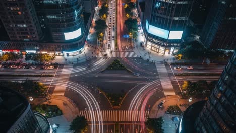 night city intersection with traffic light trails
