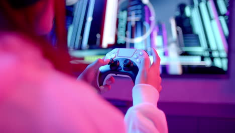 playing video game, teenage girl holding game controller and focusing on screen