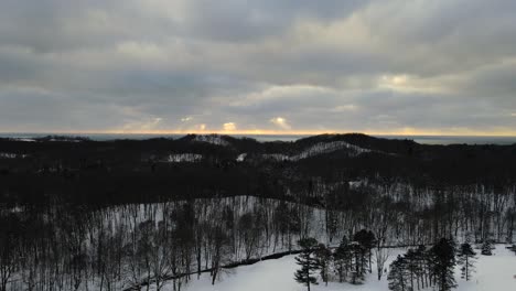 Winter-sun-peaking-through-dense-cloud-cover