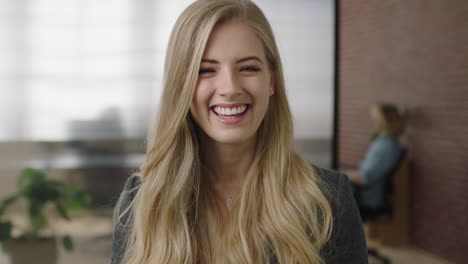 portrait of attractive young blonde woman executive smiling cheerful enjoying start up business opportunity