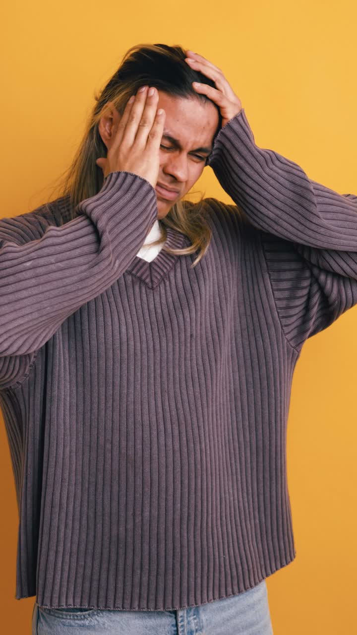 Young Man Suffering from Headache and Chest Pain