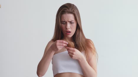 woman experiencing hair loss