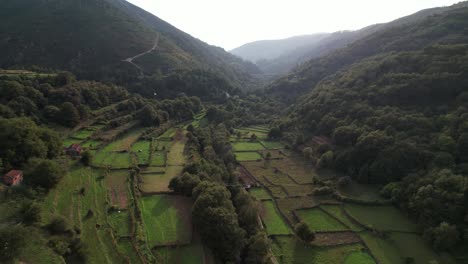 fly above village and agriculture field of sistelo, portugal 4k