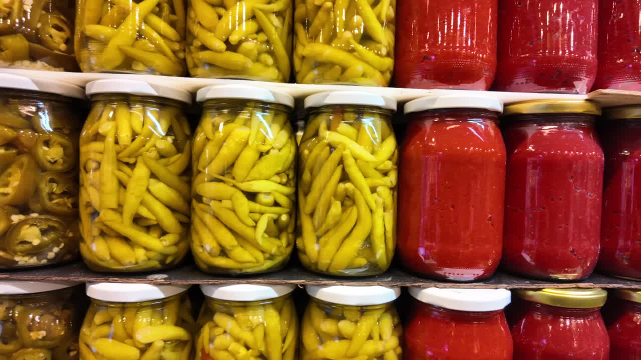 Pickled Peppers and Condiments in Jars