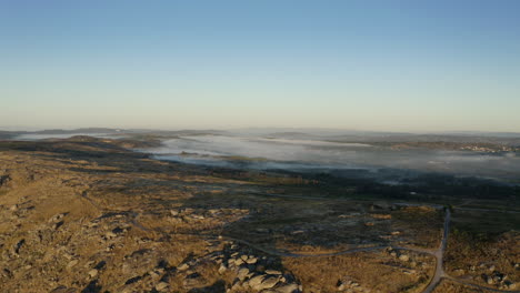 Approach-to-the-top-of-a-rocky-mountain-valley-aerial-view