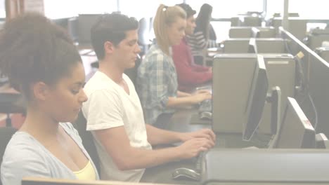 Animation-of-light-background-over-diverse-students-using-computers