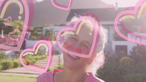 outdoors, woman smiling with pink heart animations floating around her