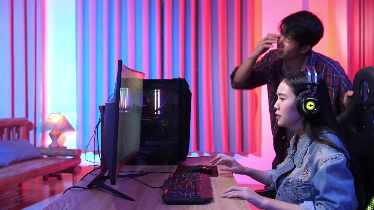 Couple Gaming Intensely