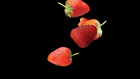 strawberries falling down with alpha channel