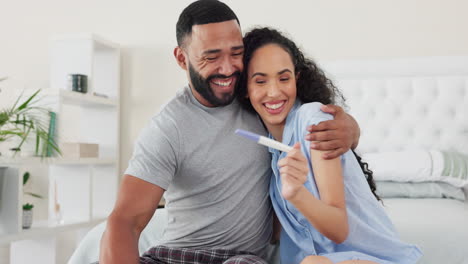 prueba de embarazo, hombre y mujer felices en el dormitorio
