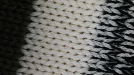 black and white knitting wool texture background - close up