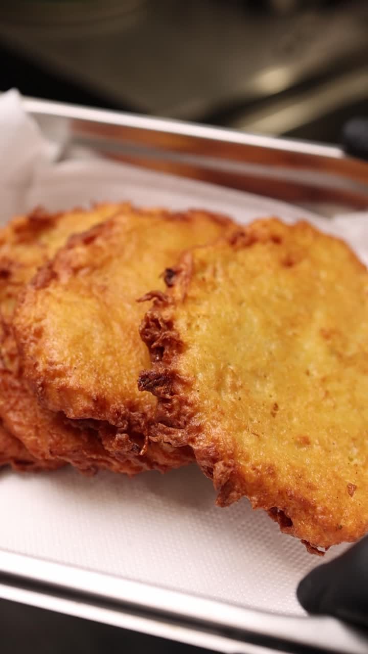 Close-up of Freshly Fried Golden Potato Pancakes