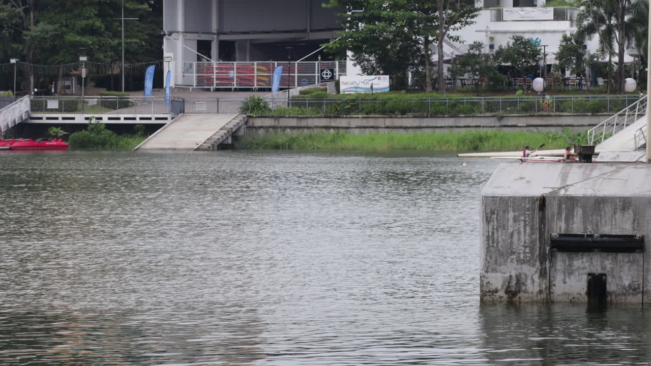 People kayaking in Marina Bay in Singapore, static view
