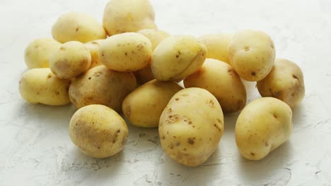 unpeeled clean potatoes in closeup