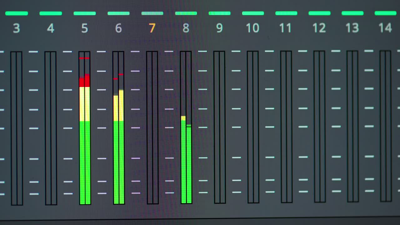 Macro of layered audio tracks playing in timeline of video editing software in Italy (Italia), showing detailed workflow in sound design