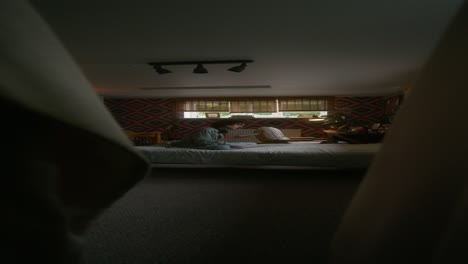 woman sitting in a vintage bedroom