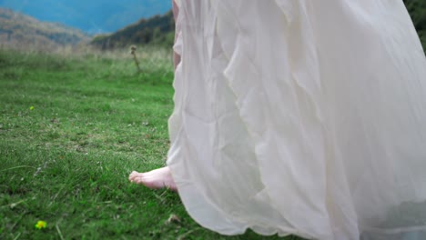 woman in a dress on the mountain