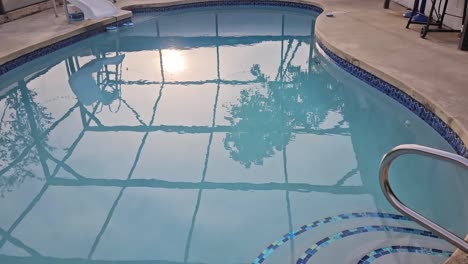 static view of florida pool in back yard during sunrise