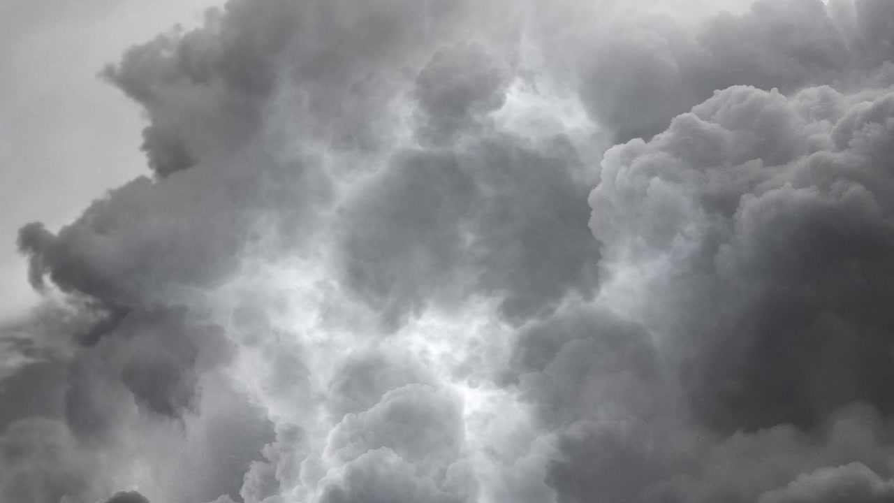 a thunderstorm flashed across the dark sky.